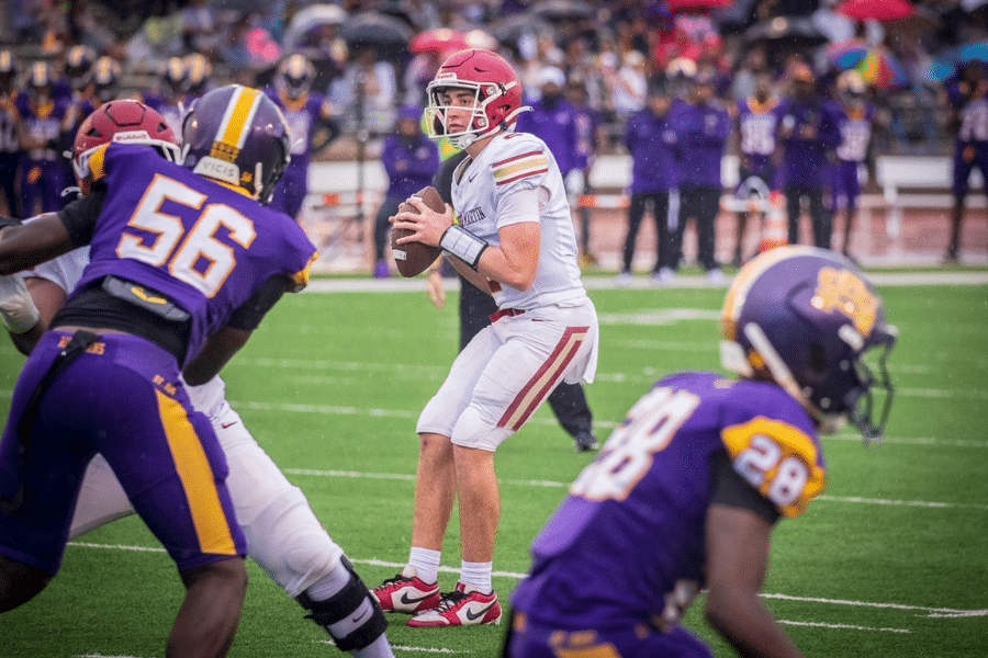 Quarterback Hudson Fields scans the St. Augustine defense to find an open receiver during the Crusaders’ recent District 9-5A game at Tad Gormley Stadium.