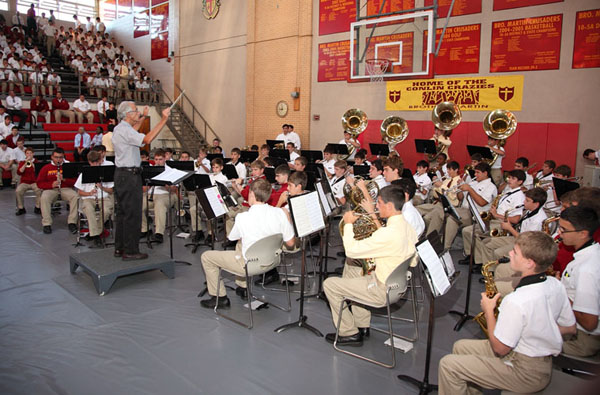 Marty Hurley leading band at schoolwide liturgy