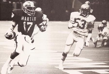 Leonce White runs vs St. Aug. 1980